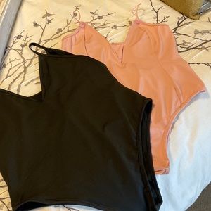 NWOT PINK AND BLACK BODYSUITS SIZE PETITE LARGE